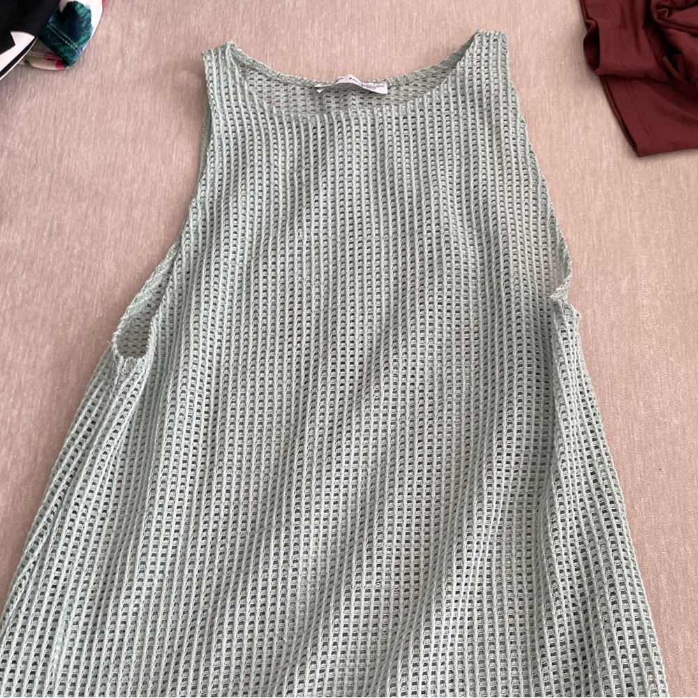 Knit sage colored cover up with tassels
